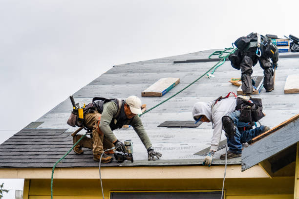 Professional Gutter Installation technician working in Greenville, RI